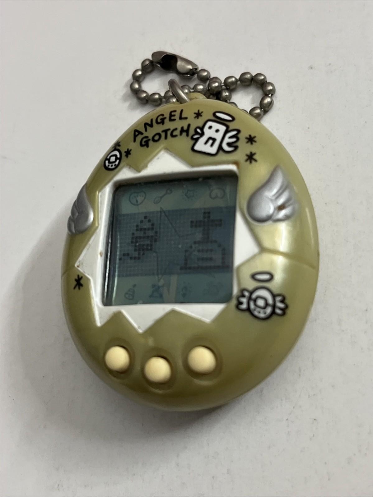 Bandai Tamagotchi Angel Gotch Portable Electronic Game Pearl 1997