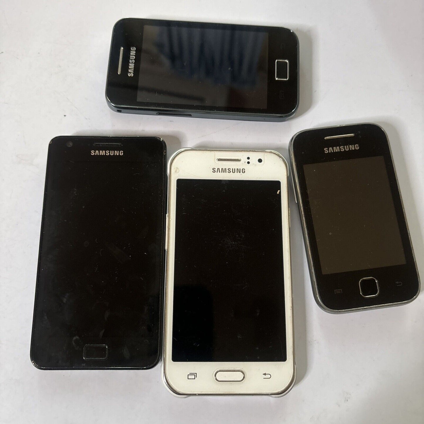 4x Samsung Mobile Phones GT-55830 GTSS960t SM-j110f/As GT-i9100t *For Parts*