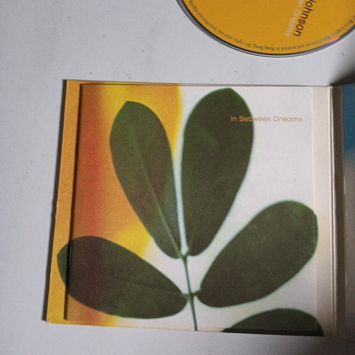 Jack Johnson – In Between Dreams (2005, Digisleeve, CD) 988 003-3