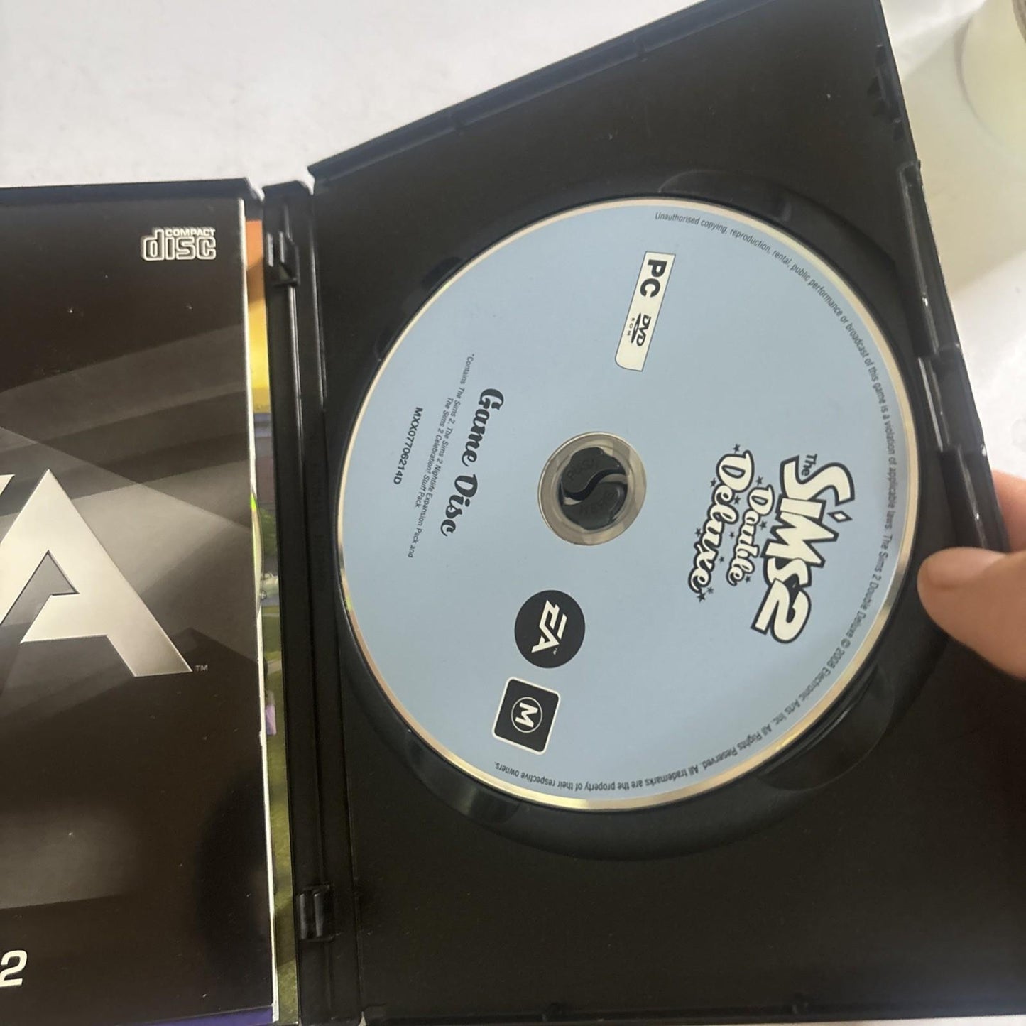The Sims 2 Double Deluxe PC CD-ROM (incl Nightlife, Celebration packs (Sims2)