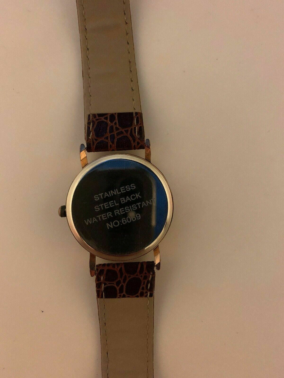 SWC Stainless Steel Back Water Resistant Analogue Watch 6069