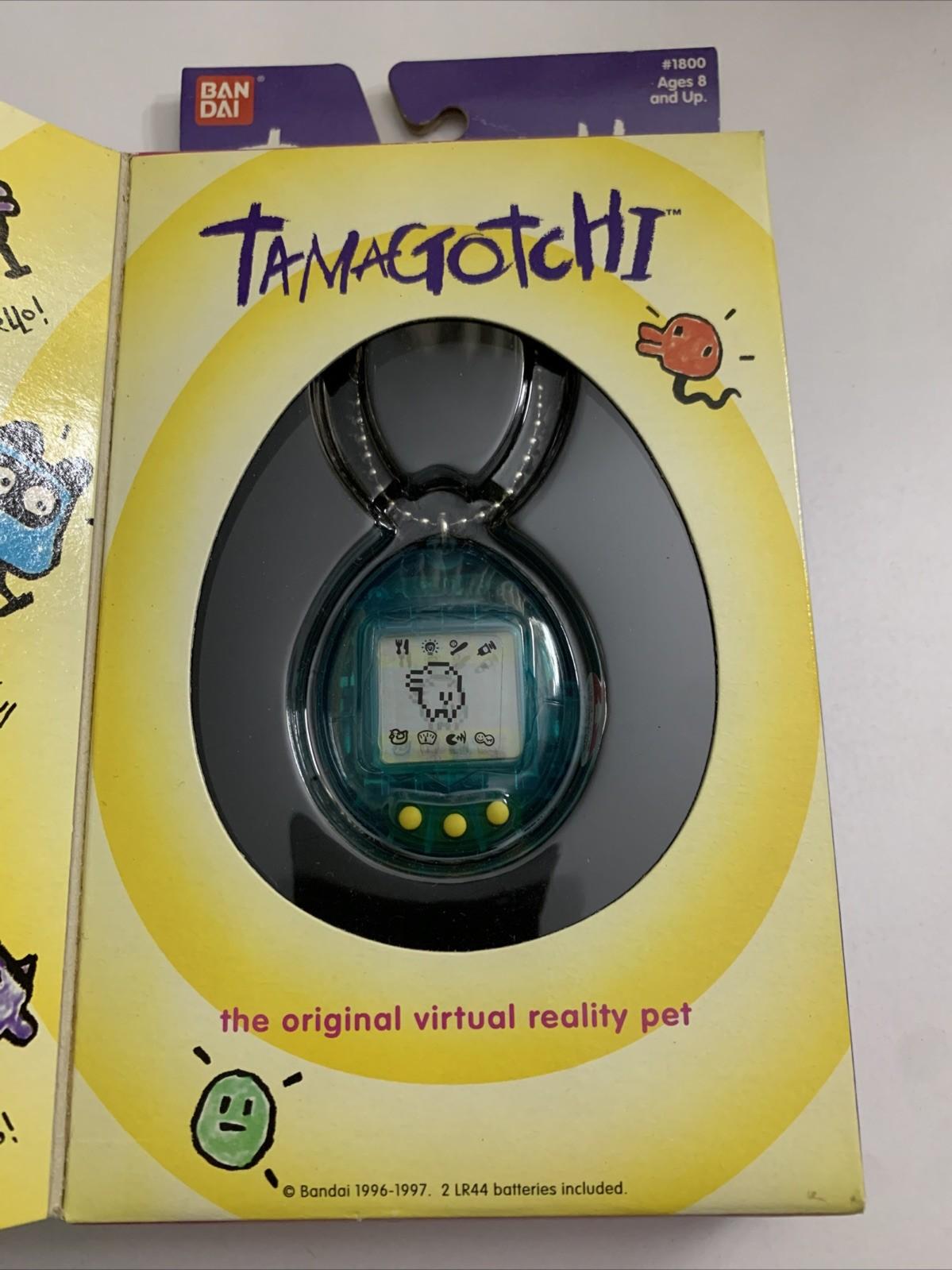 Tamagotchi Dark Green 1997 Bandai Electronic Pet #1800 NEW