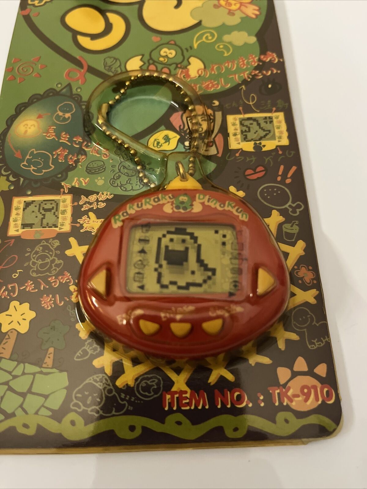 Raku Raku Dinokun Tamagotchi Red TK-910 NEW