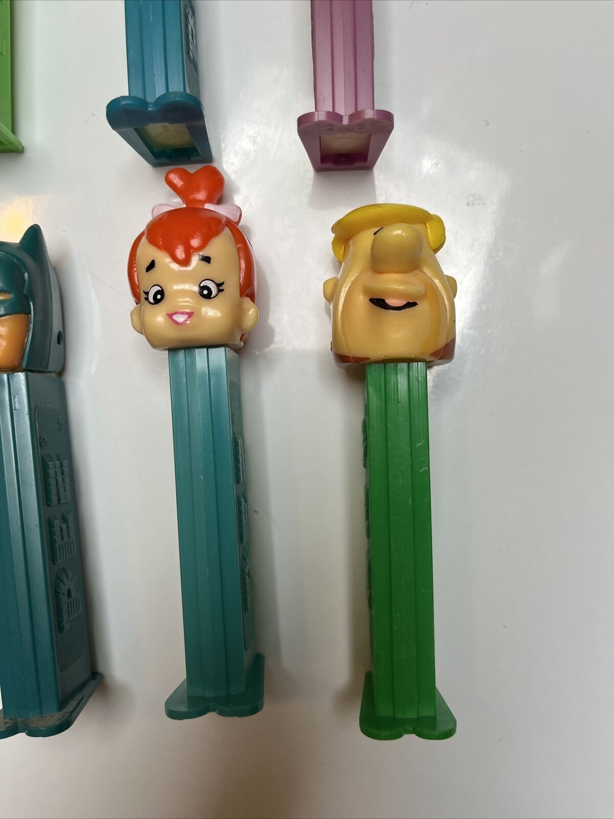 11x Pez Dispensers: Garfield, Batman, Barney, Pebbles, Tyke, The Ant & Aardvark