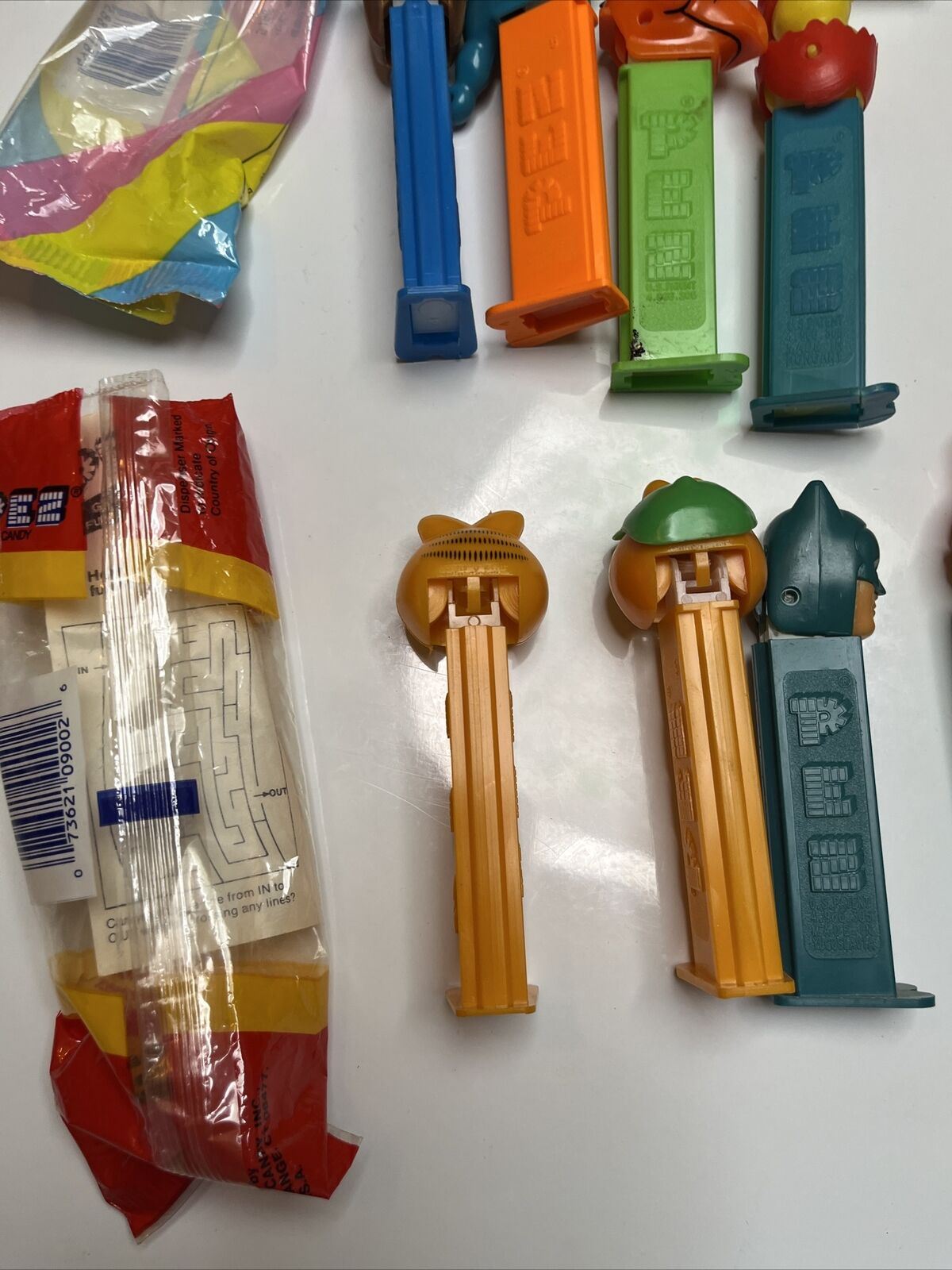11x Pez Dispensers: Garfield, Batman, Barney, Pebbles, Tyke, The Ant & Aardvark