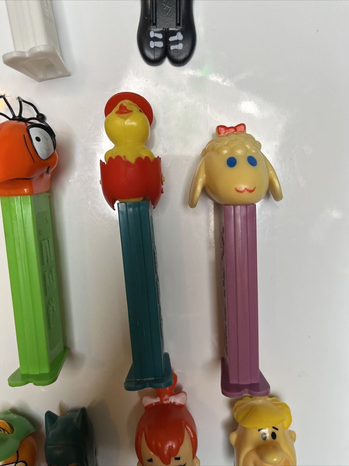 11x Pez Dispensers: Garfield, Batman, Barney, Pebbles, Tyke, The Ant & Aardvark