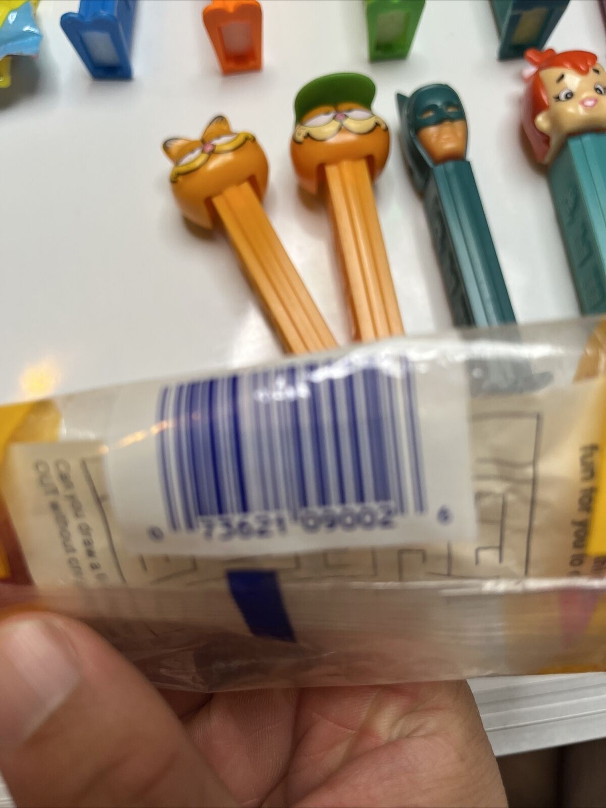 11x Pez Dispensers: Garfield, Batman, Barney, Pebbles, Tyke, The Ant & Aardvark