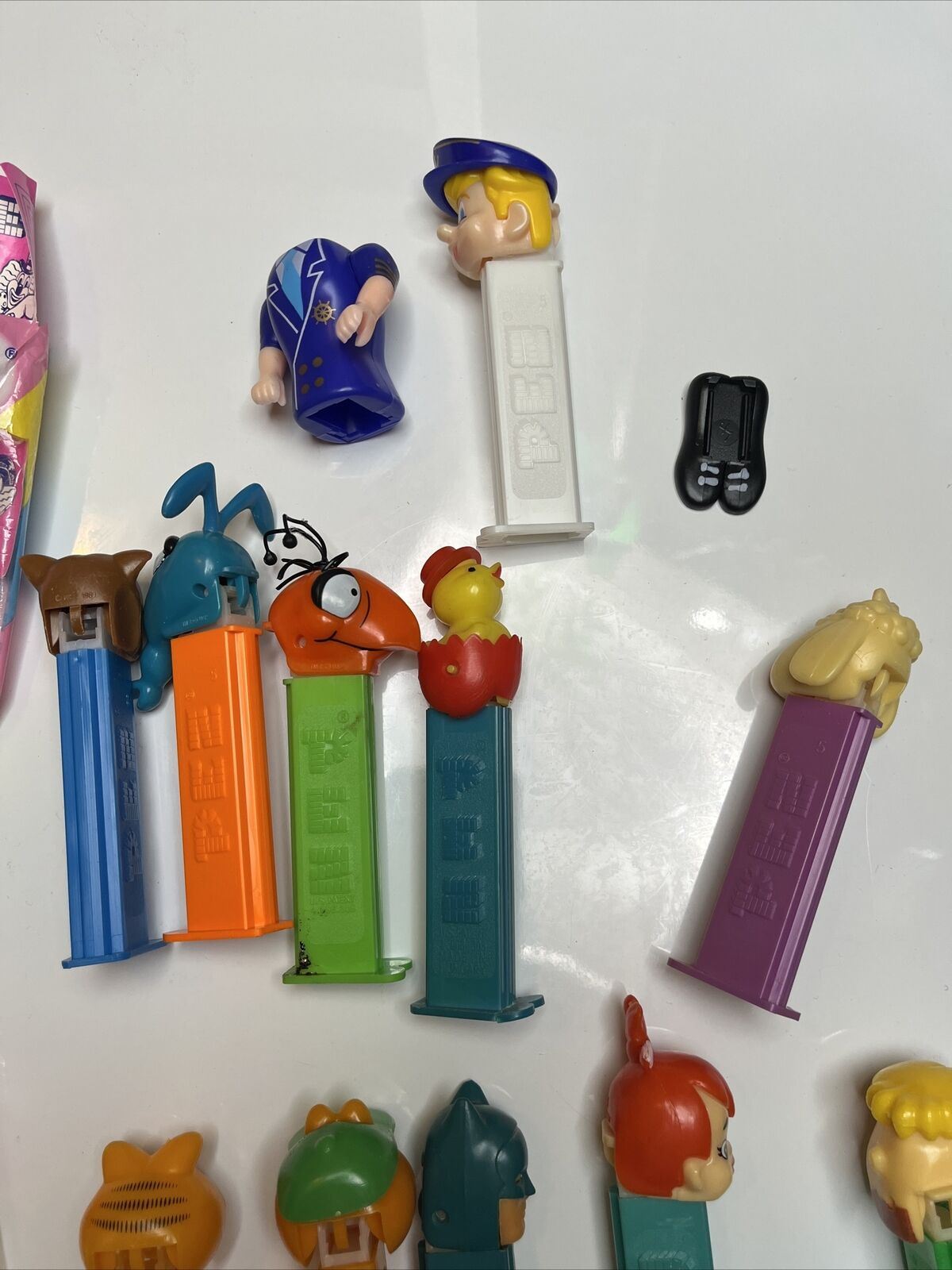 11x Pez Dispensers: Garfield, Batman, Barney, Pebbles, Tyke, The Ant & Aardvark