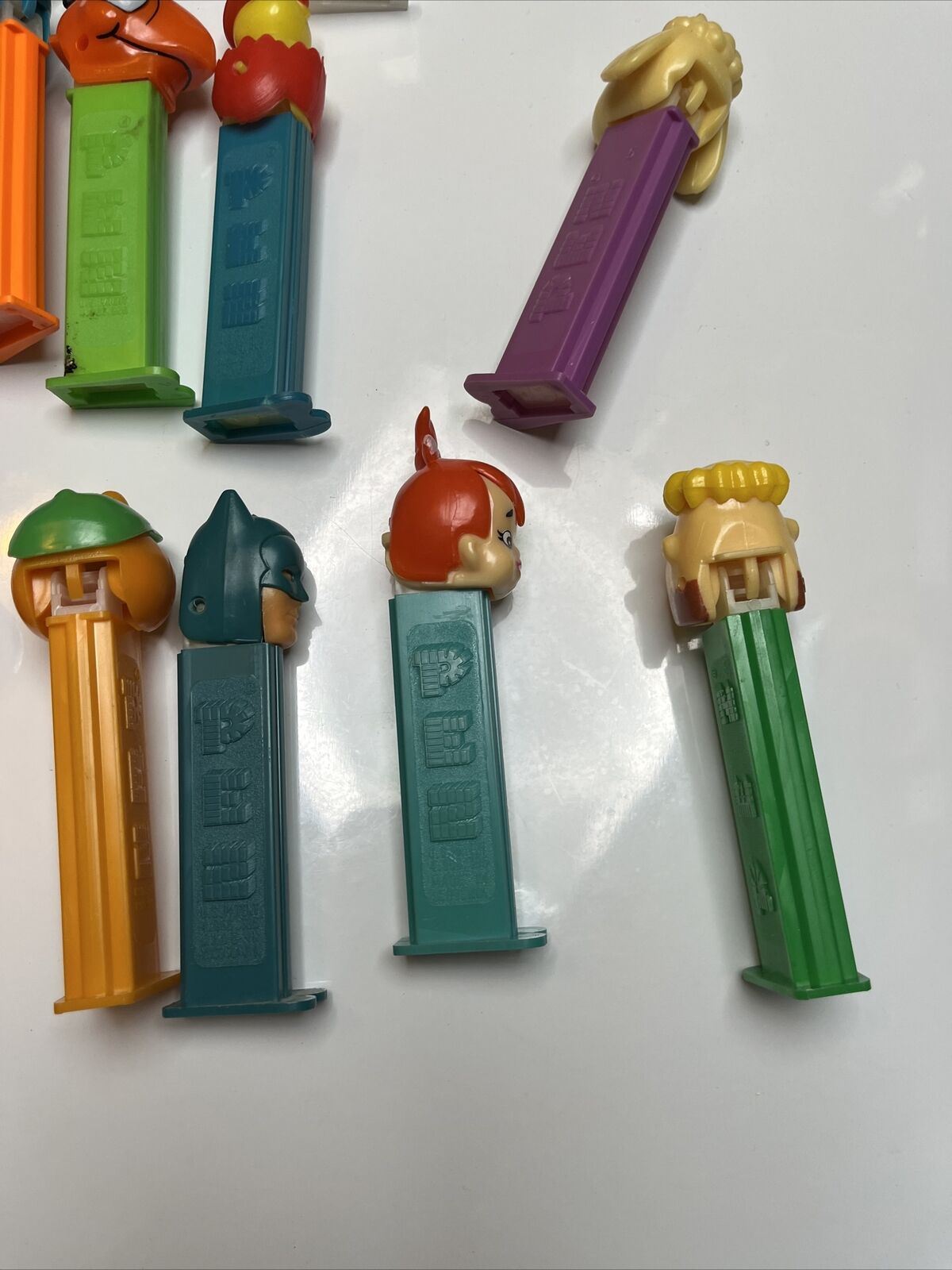 11x Pez Dispensers: Garfield, Batman, Barney, Pebbles, Tyke, The Ant & Aardvark