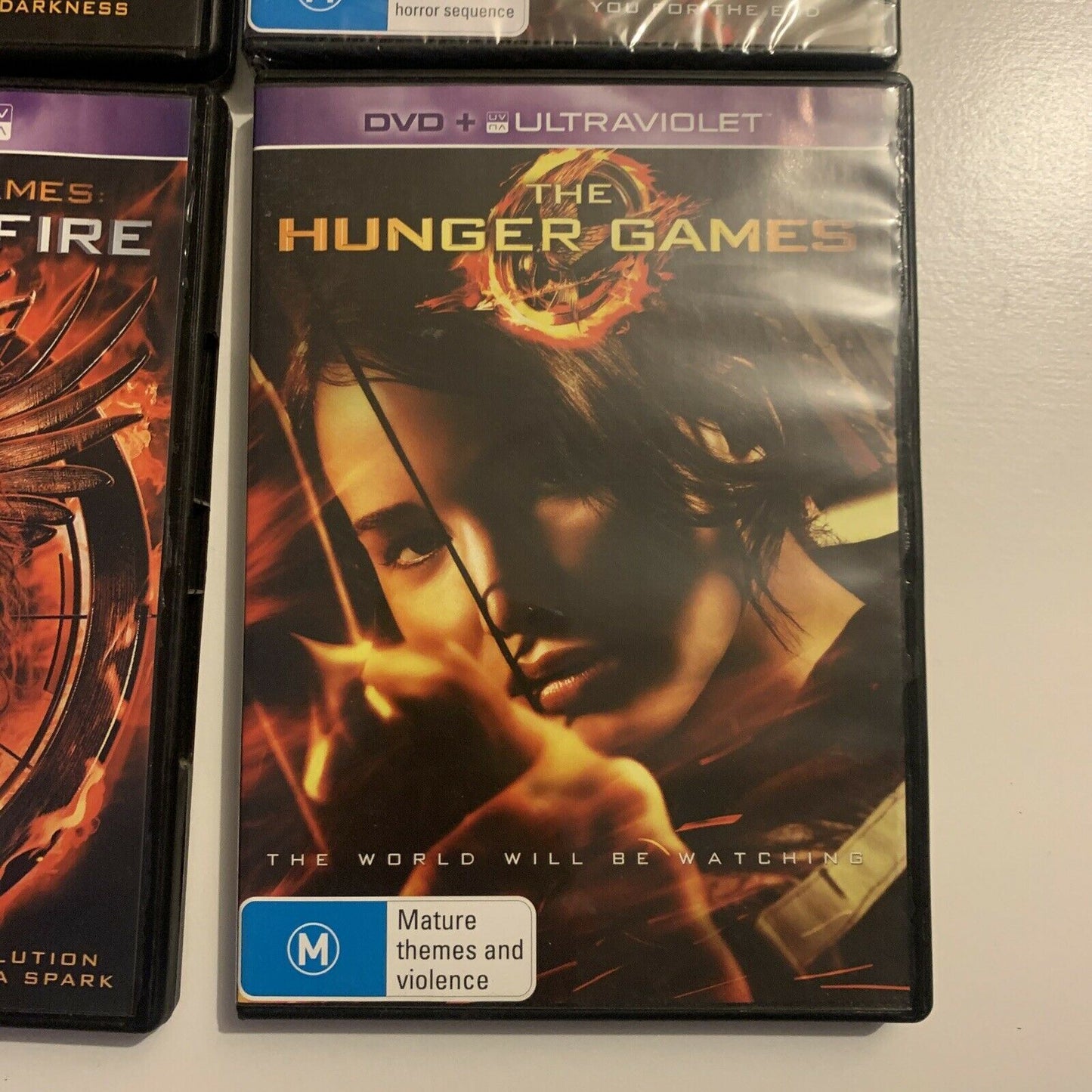 The Hunger Games / Catching Fire / Mockingjay Part 1 & 2 (DVD, 2015, 4-Disc)