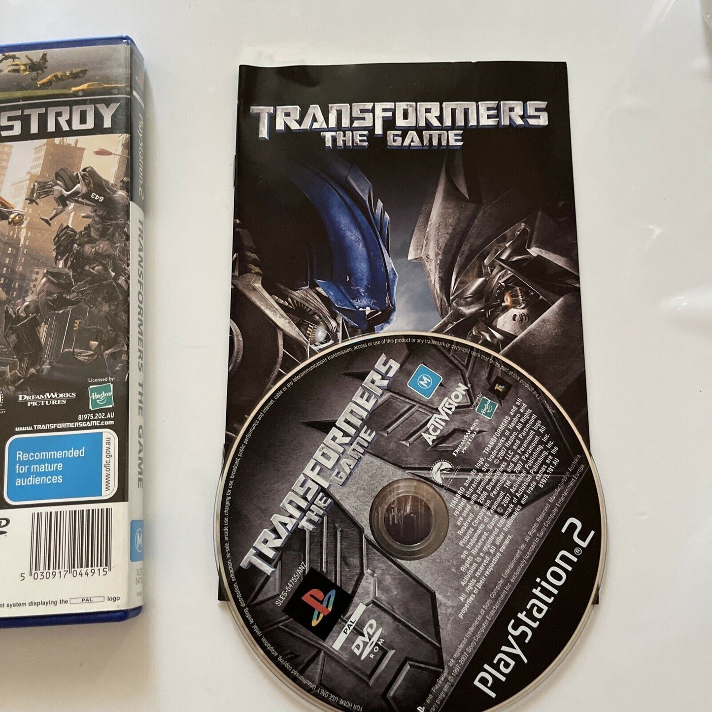 Transformers The Game - Sony Playstation 2 PS2 Game With Manual PAL