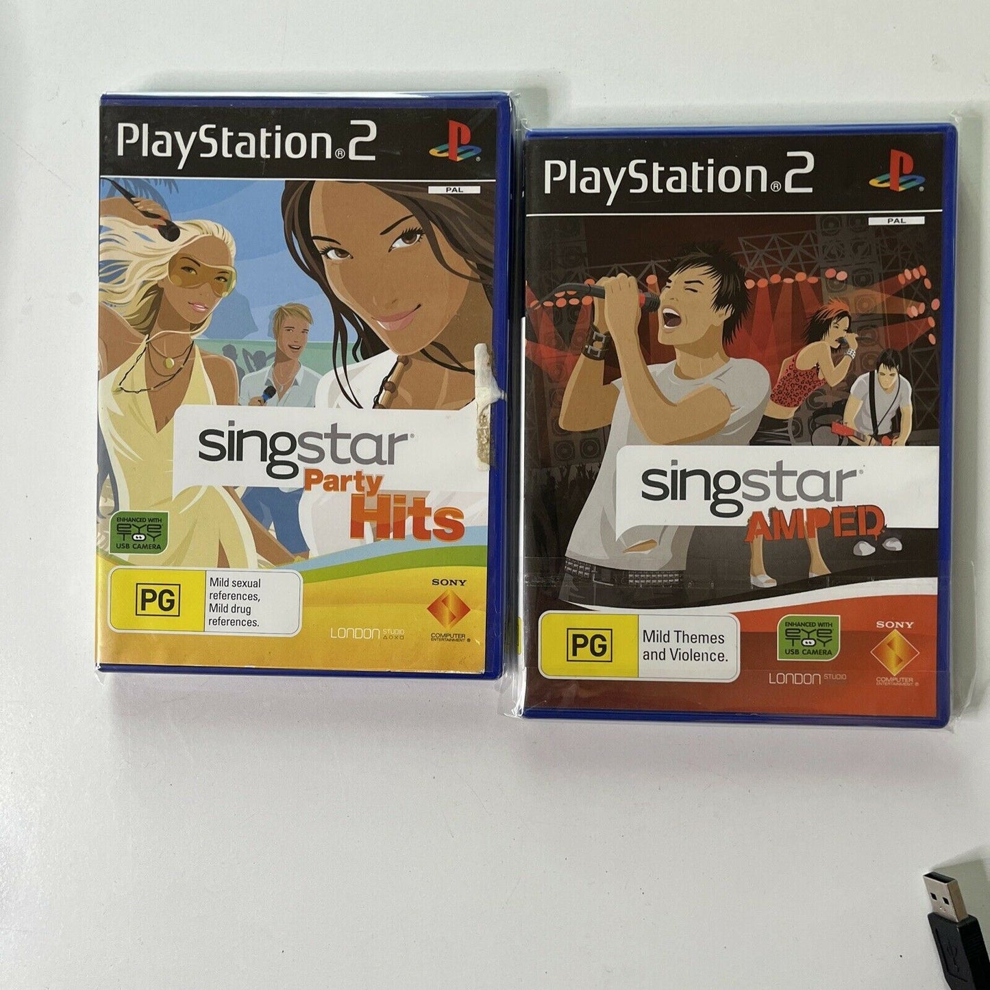 2x SingStar Wireless Microphone for PS2 & PS3 with 8x SingStar PS2 Games PAL