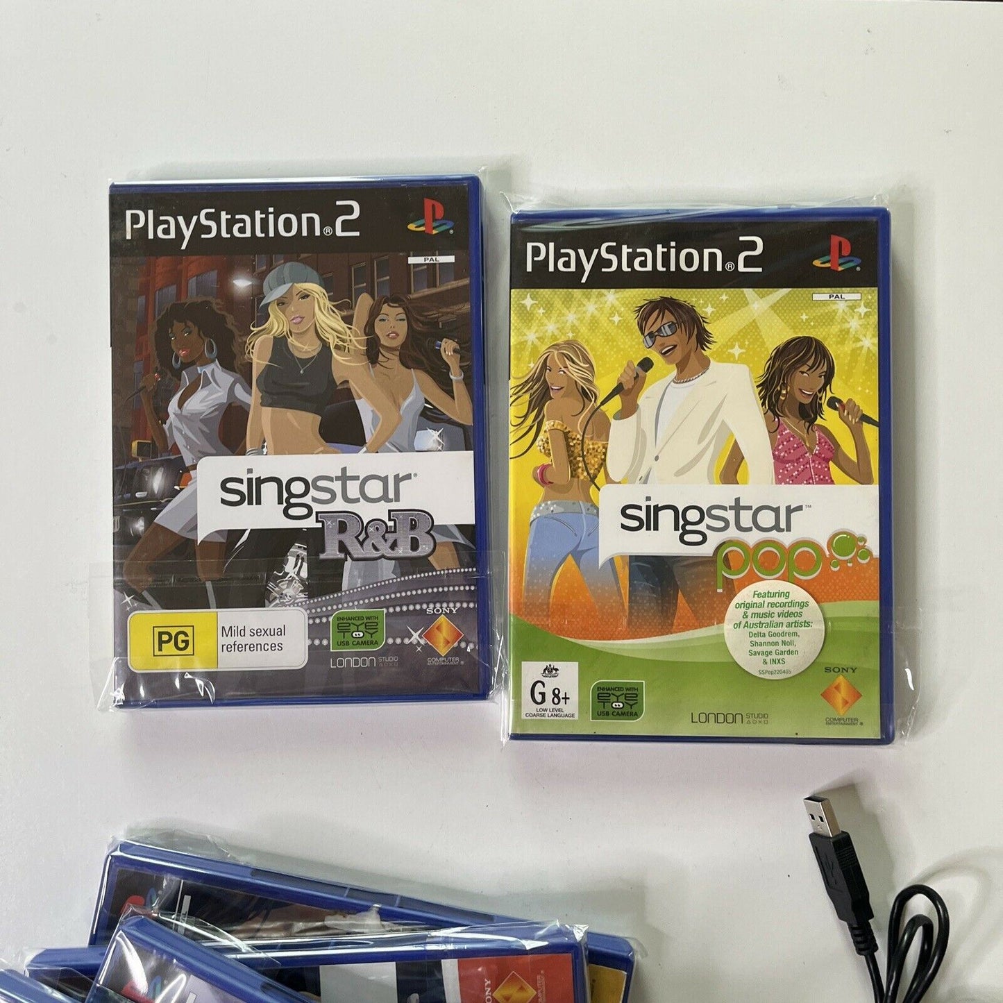 2x SingStar Wireless Microphone for PS2 & PS3 with 8x SingStar PS2 Games PAL