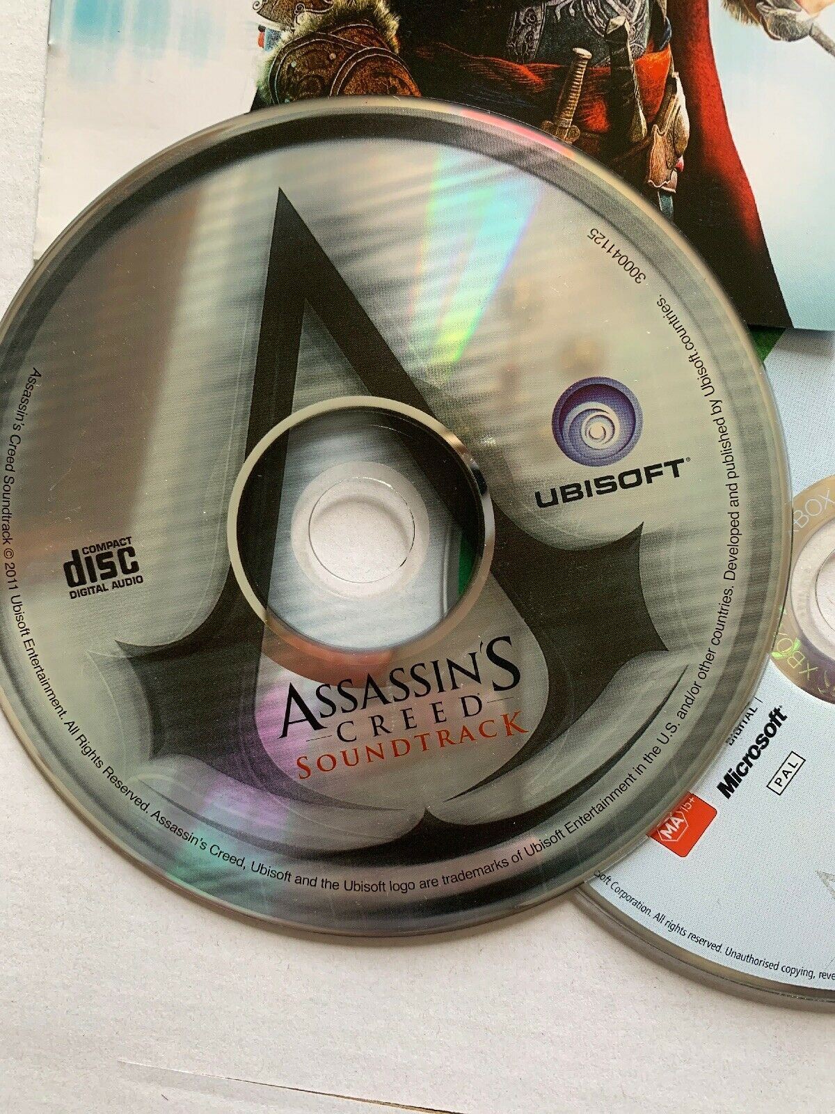 Assassin's Creed, Assassin's Creed Revelations And CD Soundtrack Xbox 360 Manual