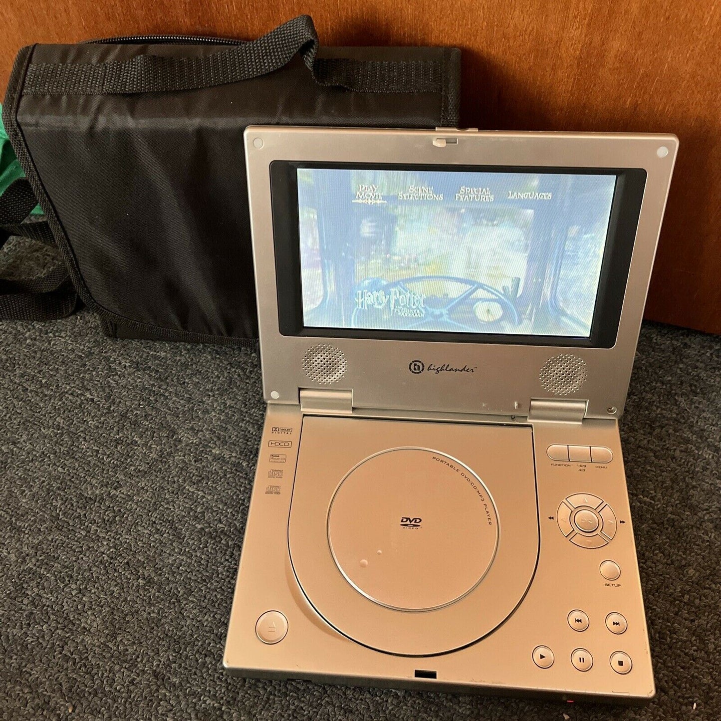 Portable 7-inch DVD Player DVD-300A with carrying case and AC Adapter