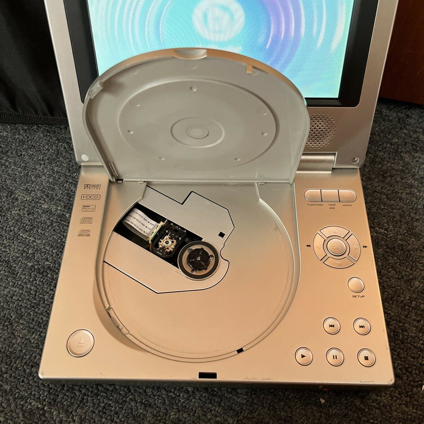 Portable 7-inch DVD Player DVD-300A with carrying case and AC Adapter