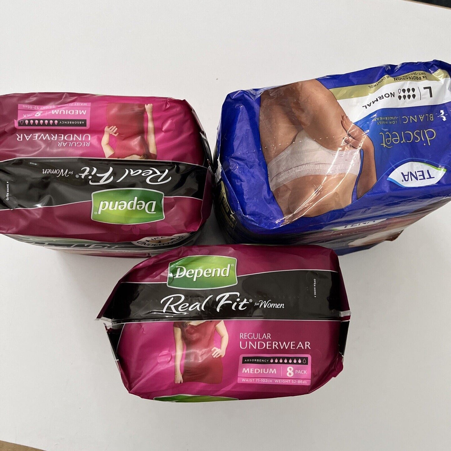 2x Depend Real-Fit Underwear Medium, Pack of 8 + Tena Discreet blanc Large 8x