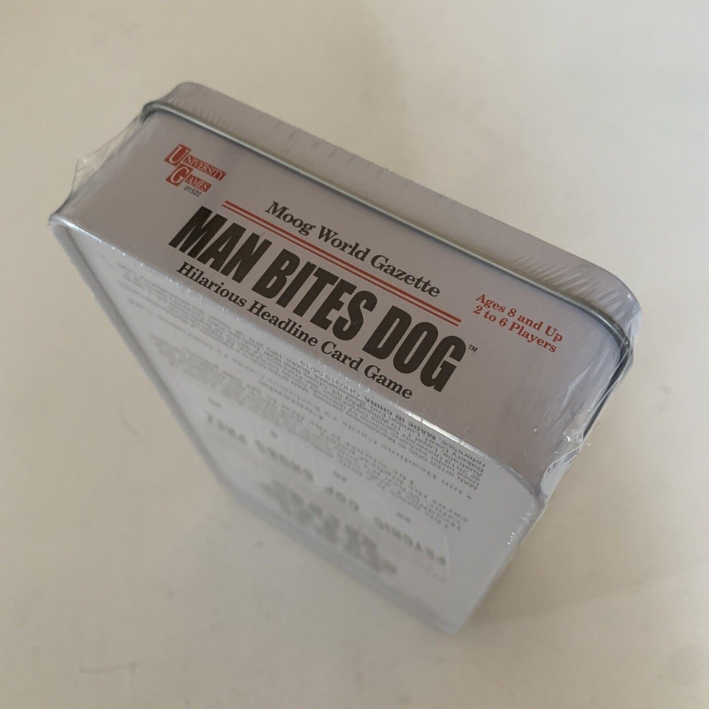 Man Bites Dog Card Game In a Tin NEW SEALED