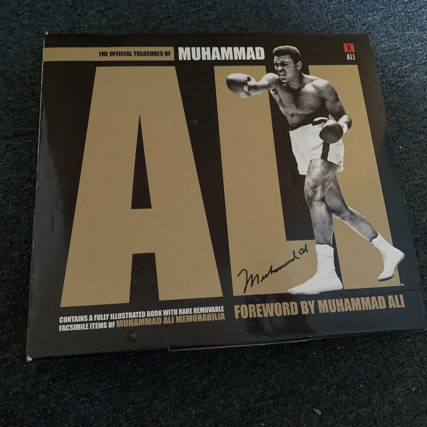 The Official Treasures of Muhammad Ali by Gavin Newsham Hardback Slip Cover
