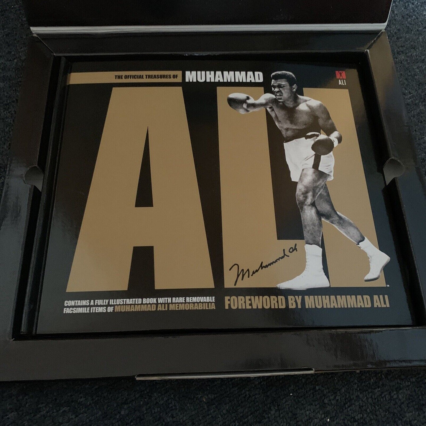 The Official Treasures of Muhammad Ali by Gavin Newsham Hardback Slip Cover
