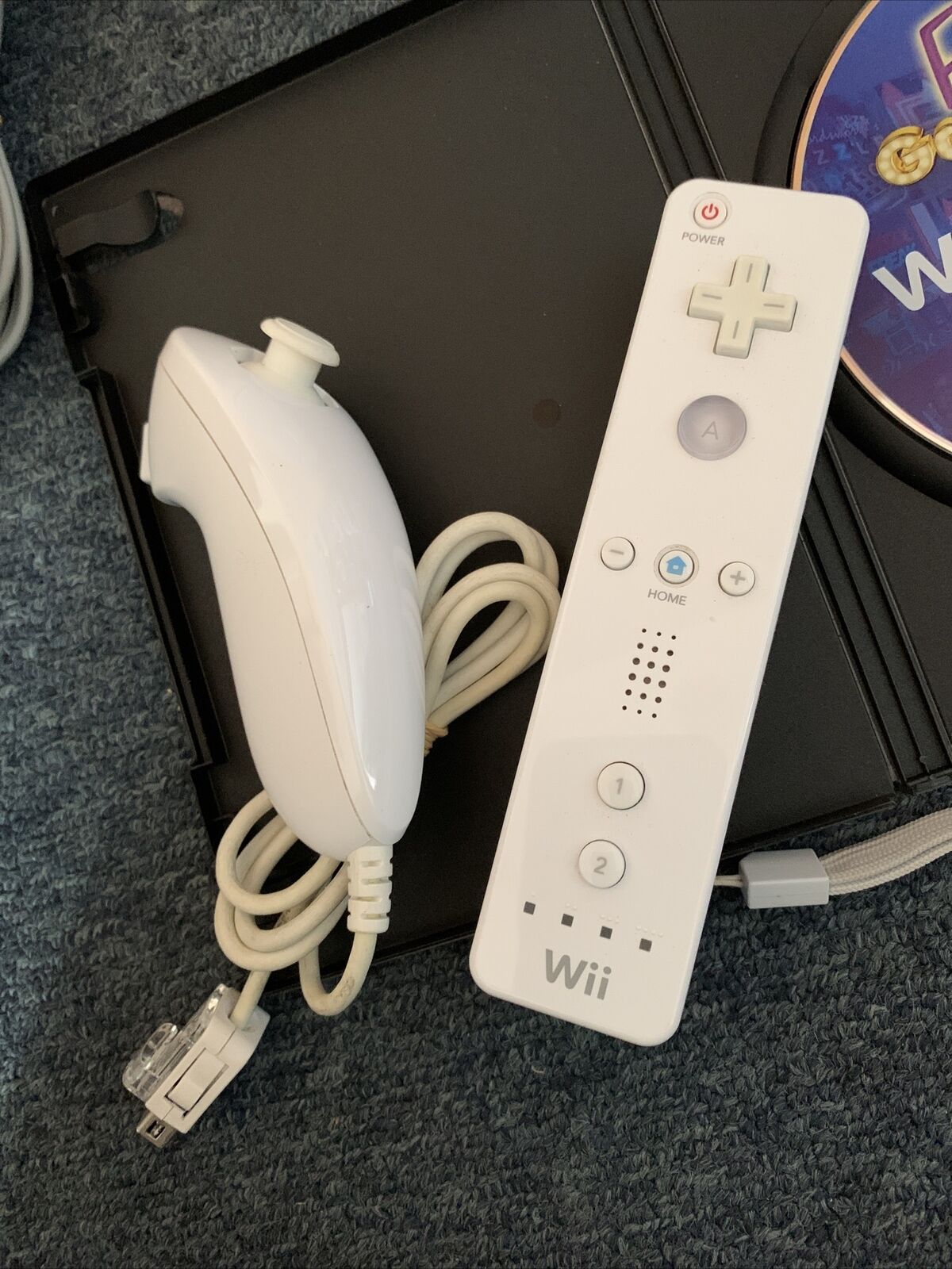 Nintendo Wii PAL Console + 1 Game Bundle with Wii Remote and Nunchuck