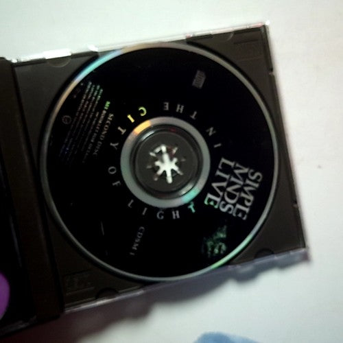 Simple Minds – Live In The City Of Light (CD) Europe 0777 7 86379 2 0