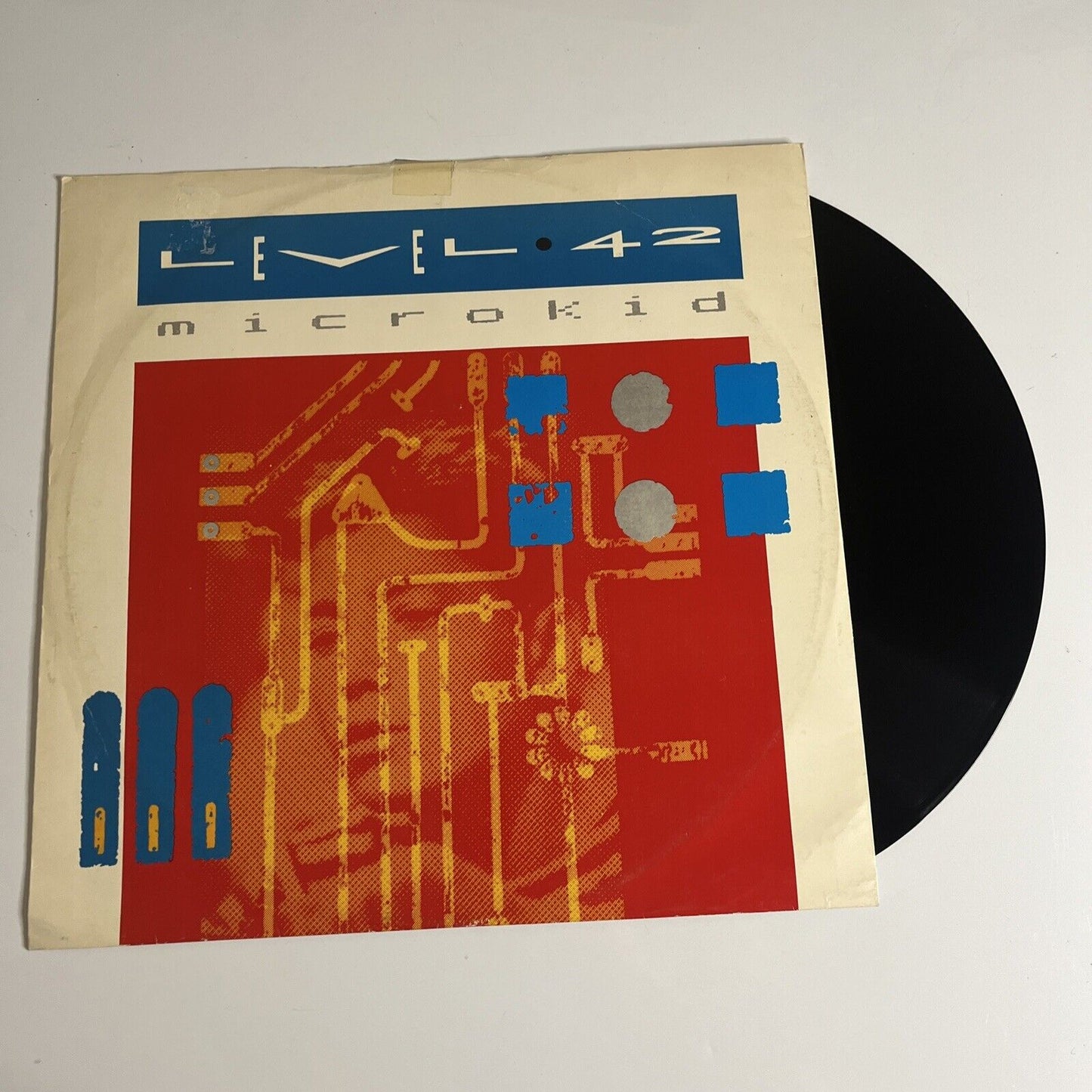 Level 42 – Micro-Kid 12" Vinyl 1983 Polydor Records 45RPM POSPX 643