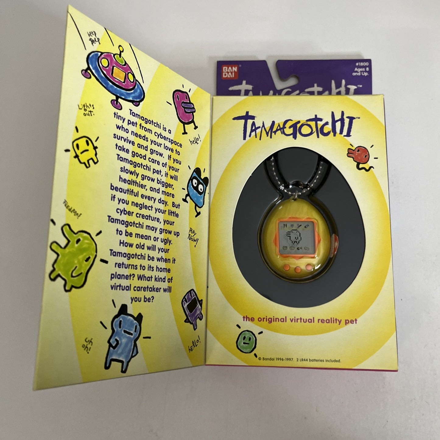 Tamagotchi Yellow Orange Portable Virtual Pet Electronic Game 1997 NEW