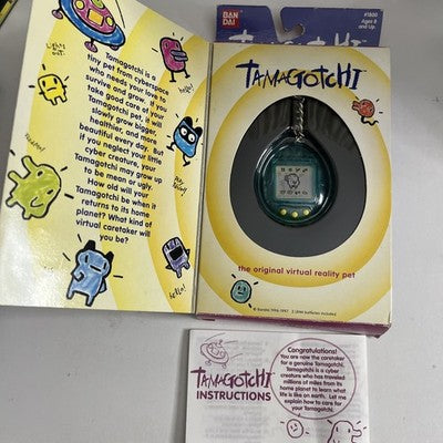 Bandai Tamagotchi Aqua Blue 1997 Pet Electronic Game