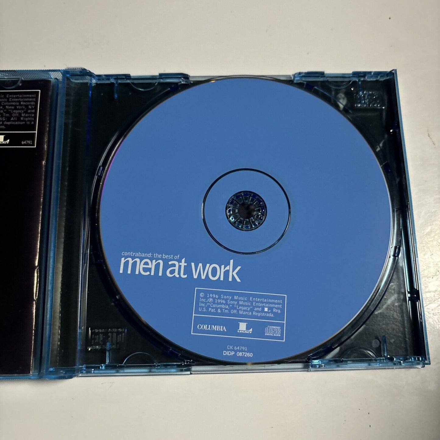 Men At Work - Contraband: The Best Of Men At Work (CD, 1996) Blue Case CK 64791