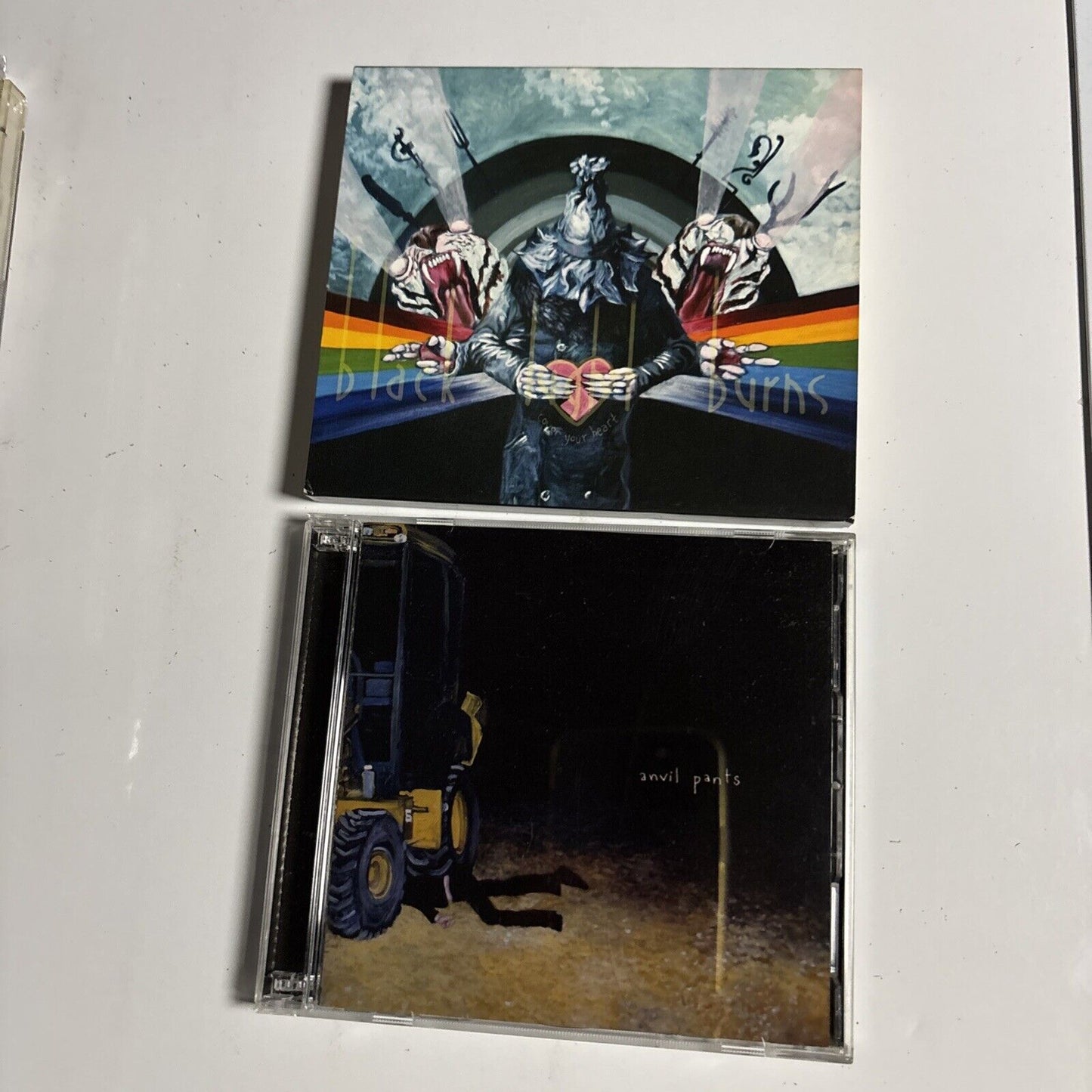 Black Light Burns – Cover Your Heart And The Anvil Pants Odyssey (CD + DVD 2008)