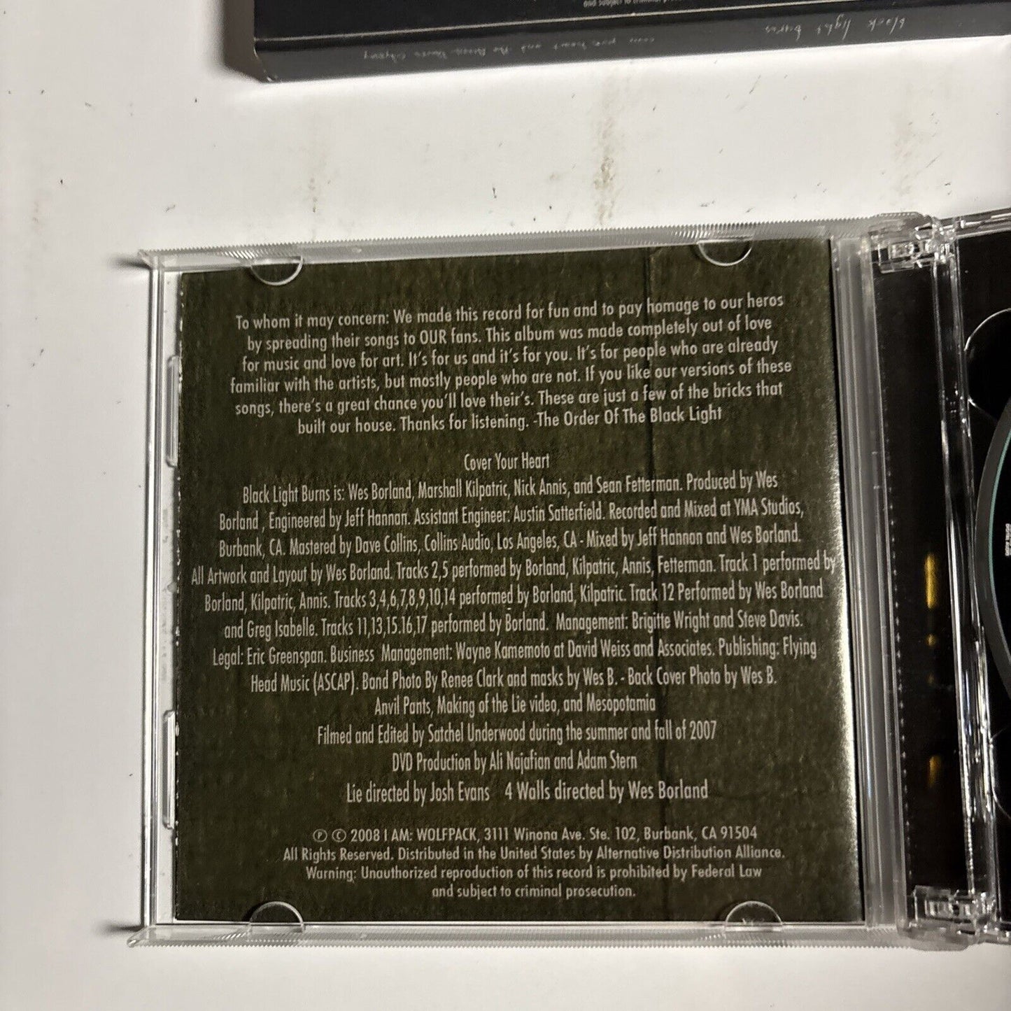 Black Light Burns – Cover Your Heart And The Anvil Pants Odyssey (CD + DVD 2008)