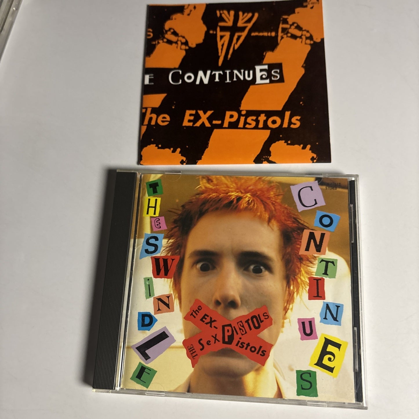 Sex Pistols, The Ex Pistols – The Swindle Continues (CD, 1990) Japan TFCK-88512