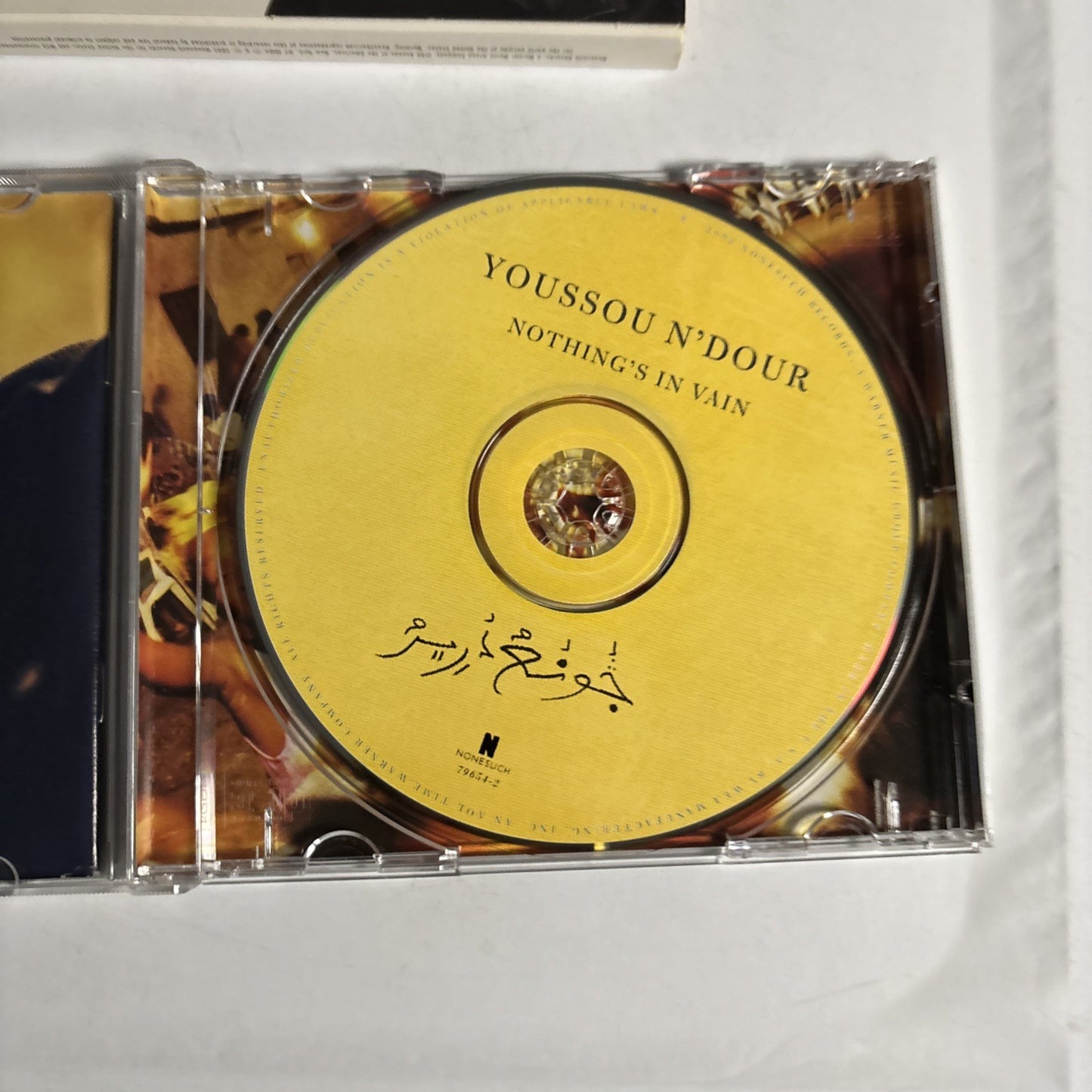 Youssou N'Dour – Nothing's In Vain (Coono Du Réér) (CD, 2002) US 79654-2