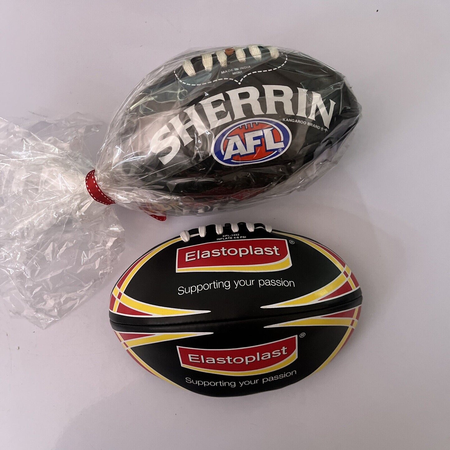 *New* Black Sherrin Grass Surface Mini AFL Football & Elastoplast Mini Football