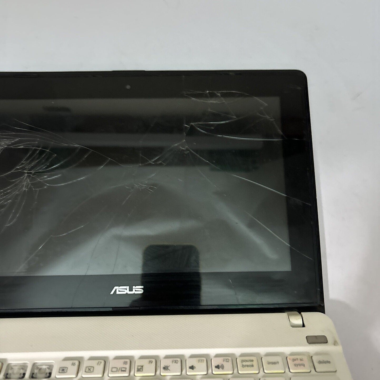 Asus F102B Laptop 320gb HDD *For Parts/Repair: Keys Missing, Broken LCD Battery*