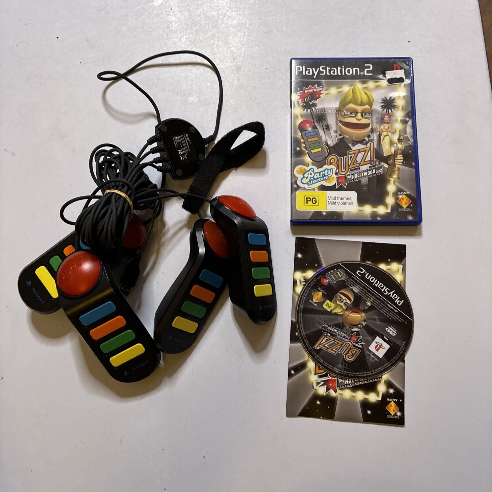 Buzz The Hollywood Quiz + Buzz Controllers Sony PS2 Manual PAL – Retro Unit