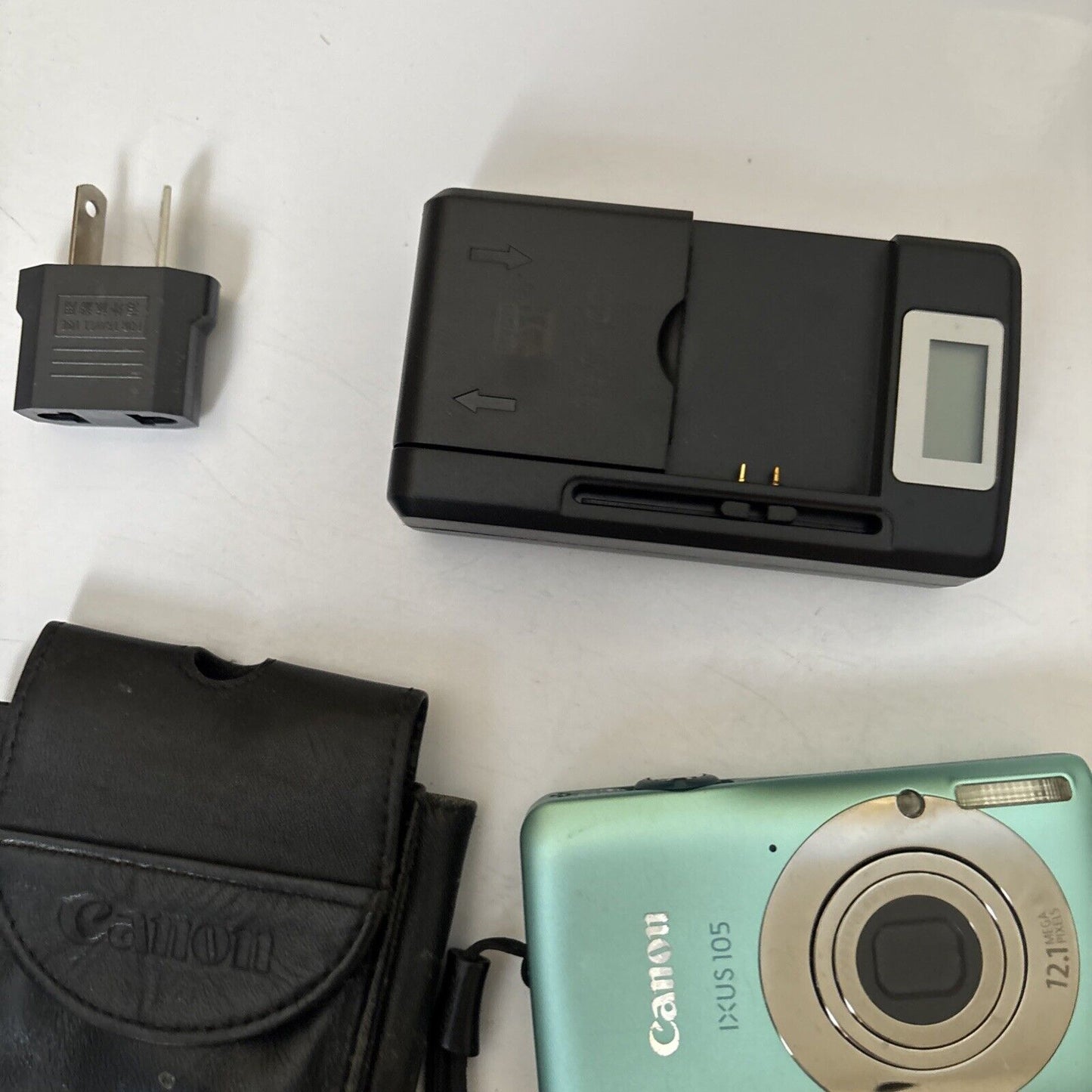 Canon IXUS 105 PowerShot Digital Camera 12.1 MP 128mb SD Card