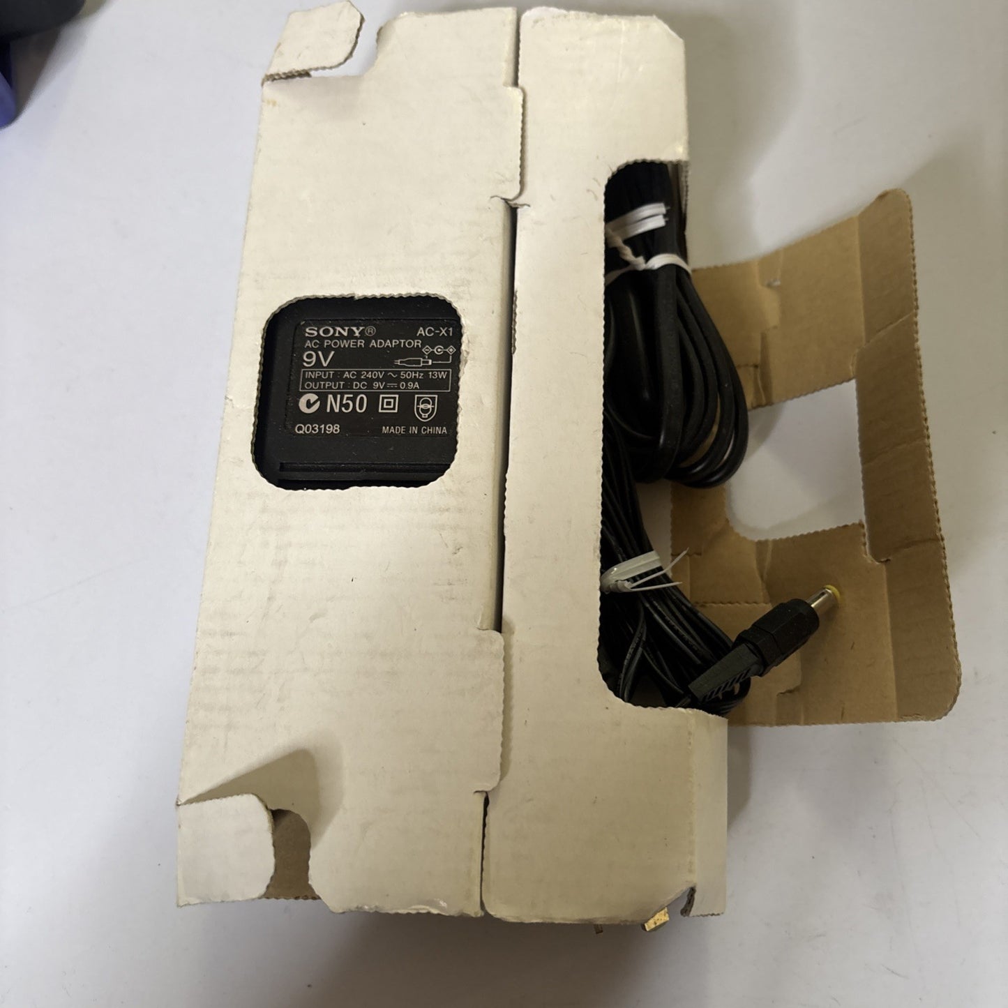 Genuine Sony AC-X1 AC Power Adapter 9V 0.9A