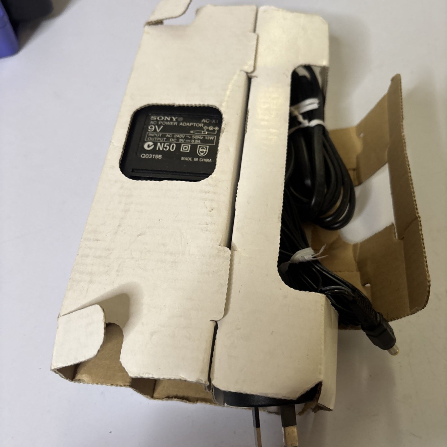 Genuine Sony AC-X1 AC Power Adapter 9V 0.9A