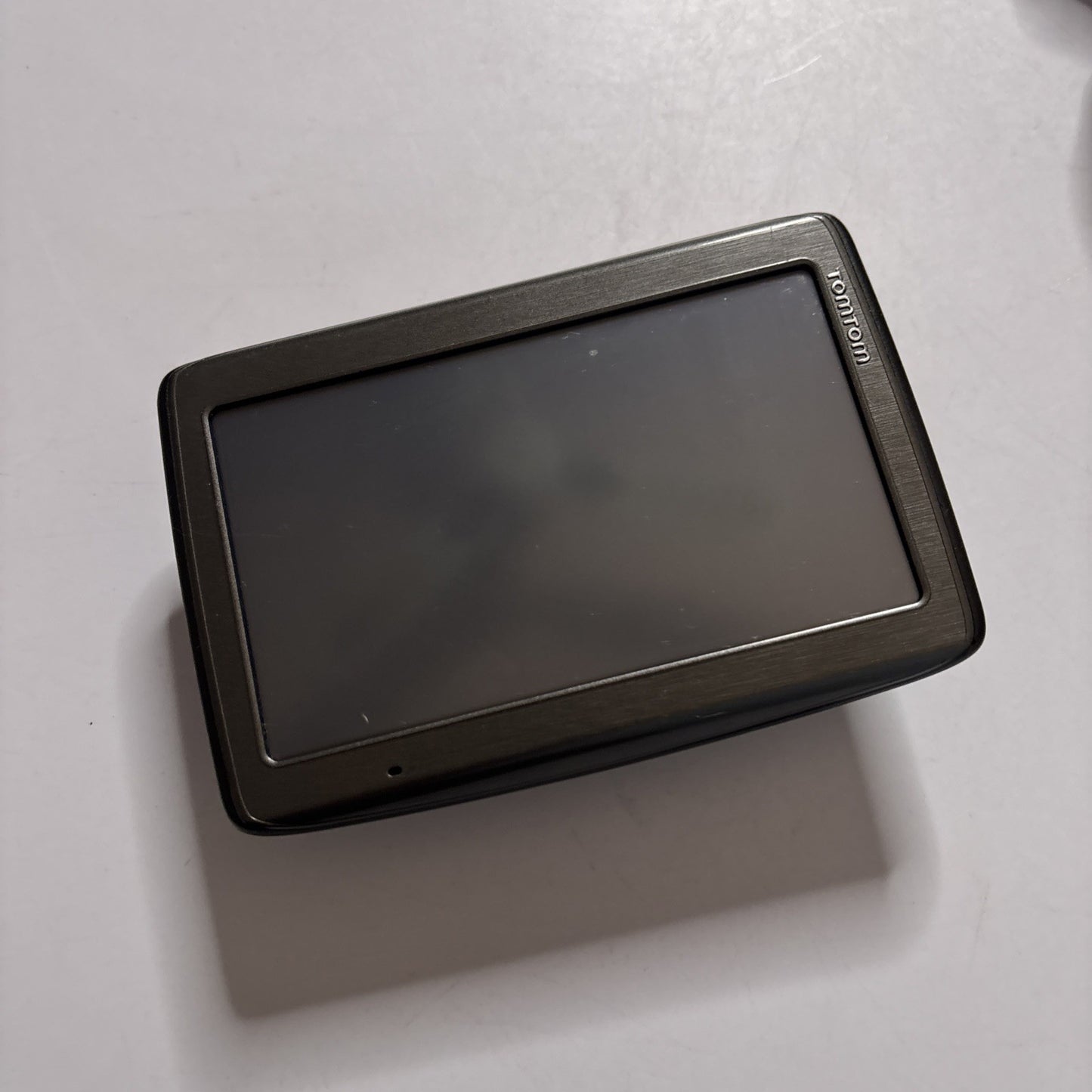 2x TomTom 4E050 Z1230 & XXL & 1x Navman GPS N275 *Turns on but Battery Untested*