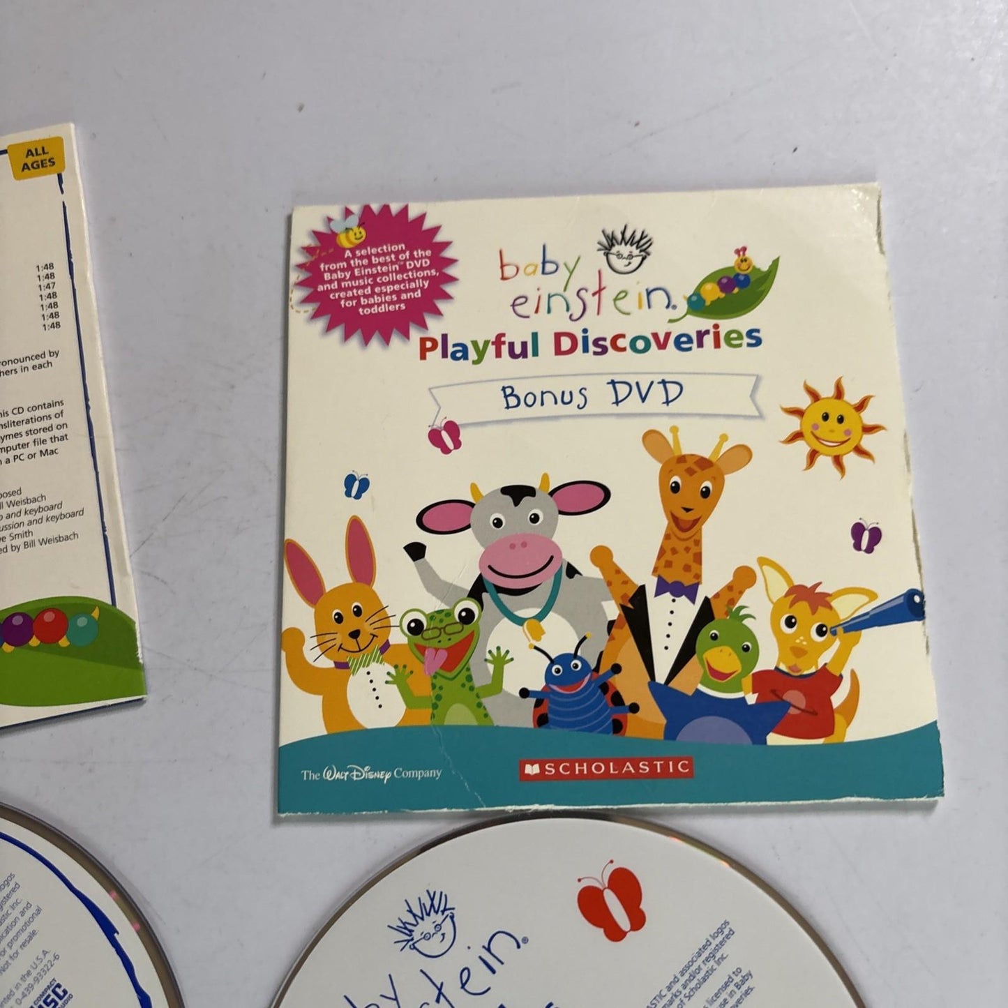 Baby Einstein: Playful Discoveries - Language Nursery CD + Bonus DVD