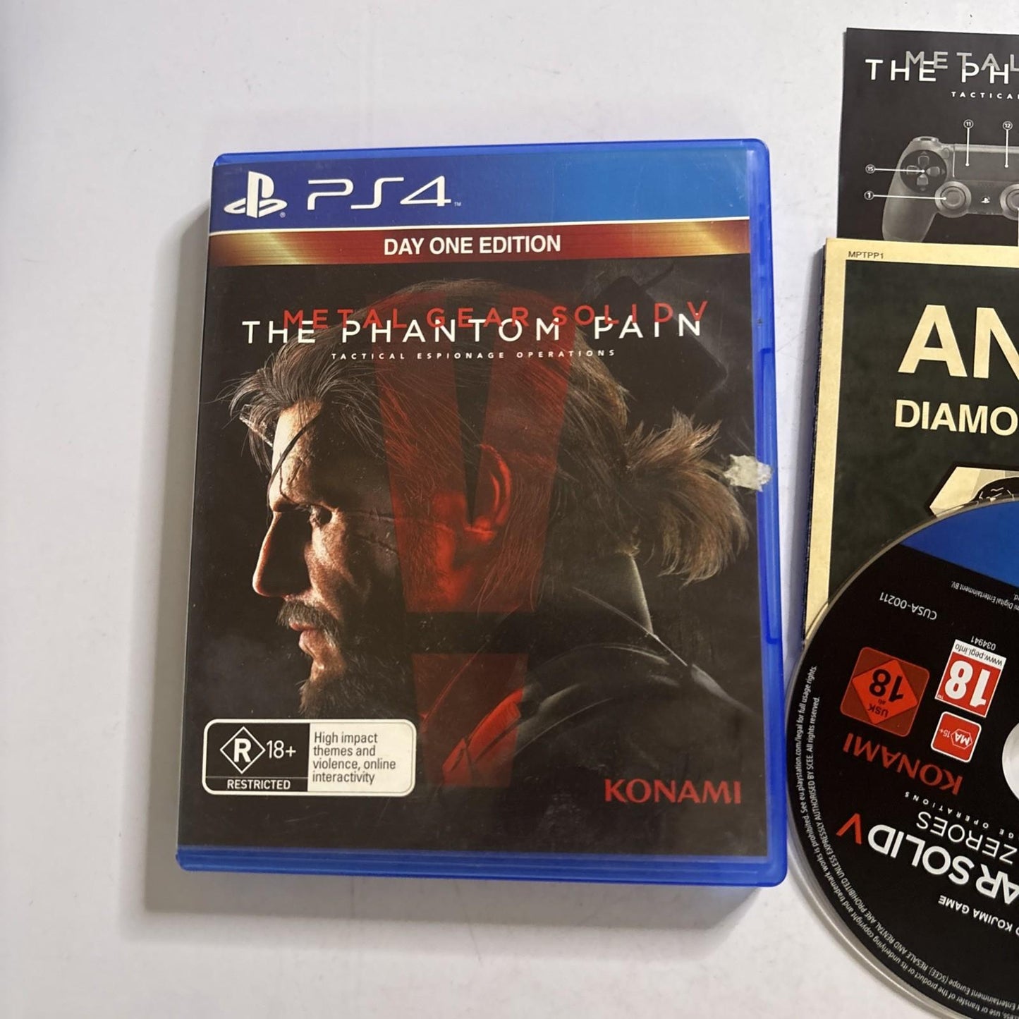 Metal Gear Solid V Phantom Pain - Day One Edition Sony PS4 Complete W/ Map