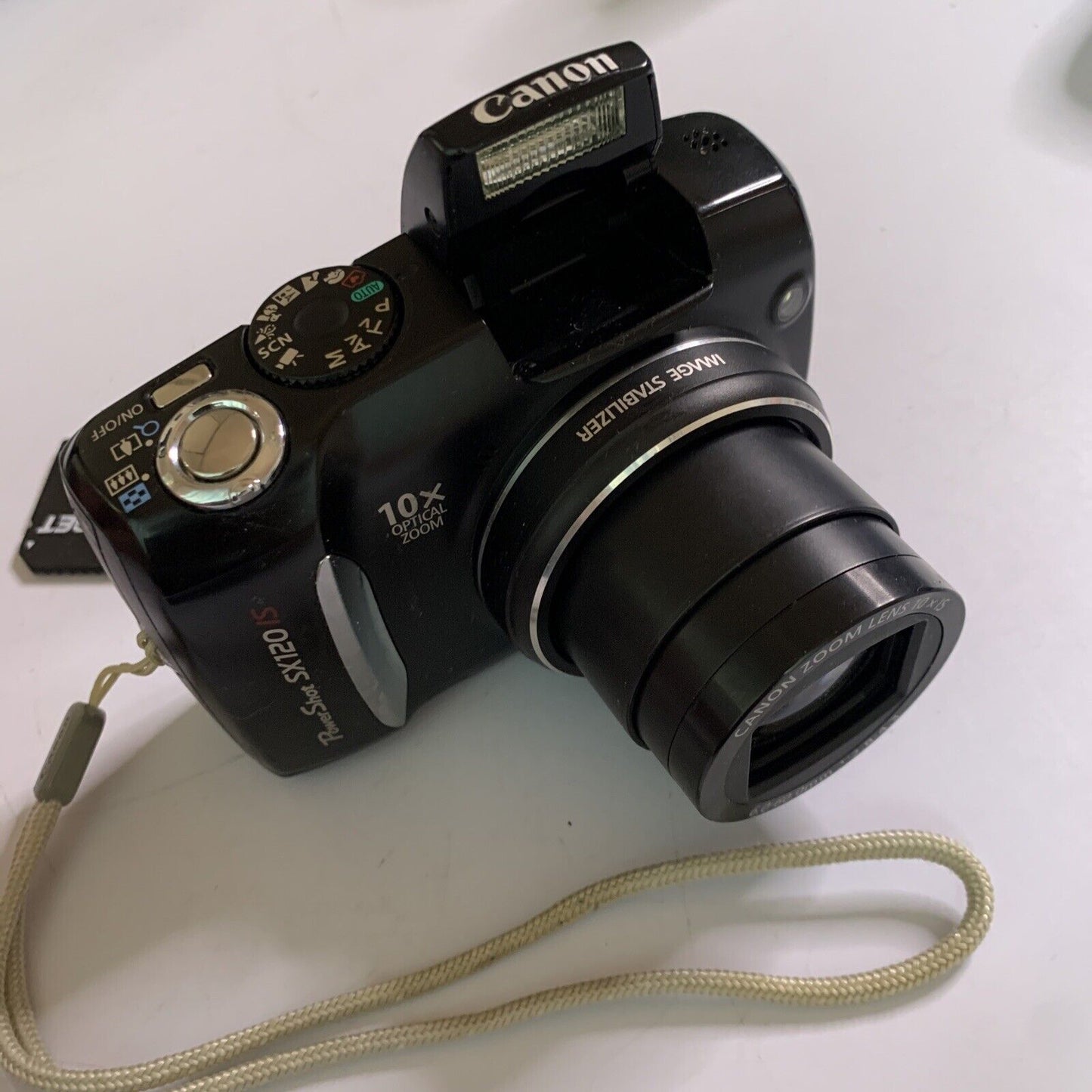 Canon PowerShot SX1 IS 10.0 MP Digital Camera 20x Optical Zoom Flash