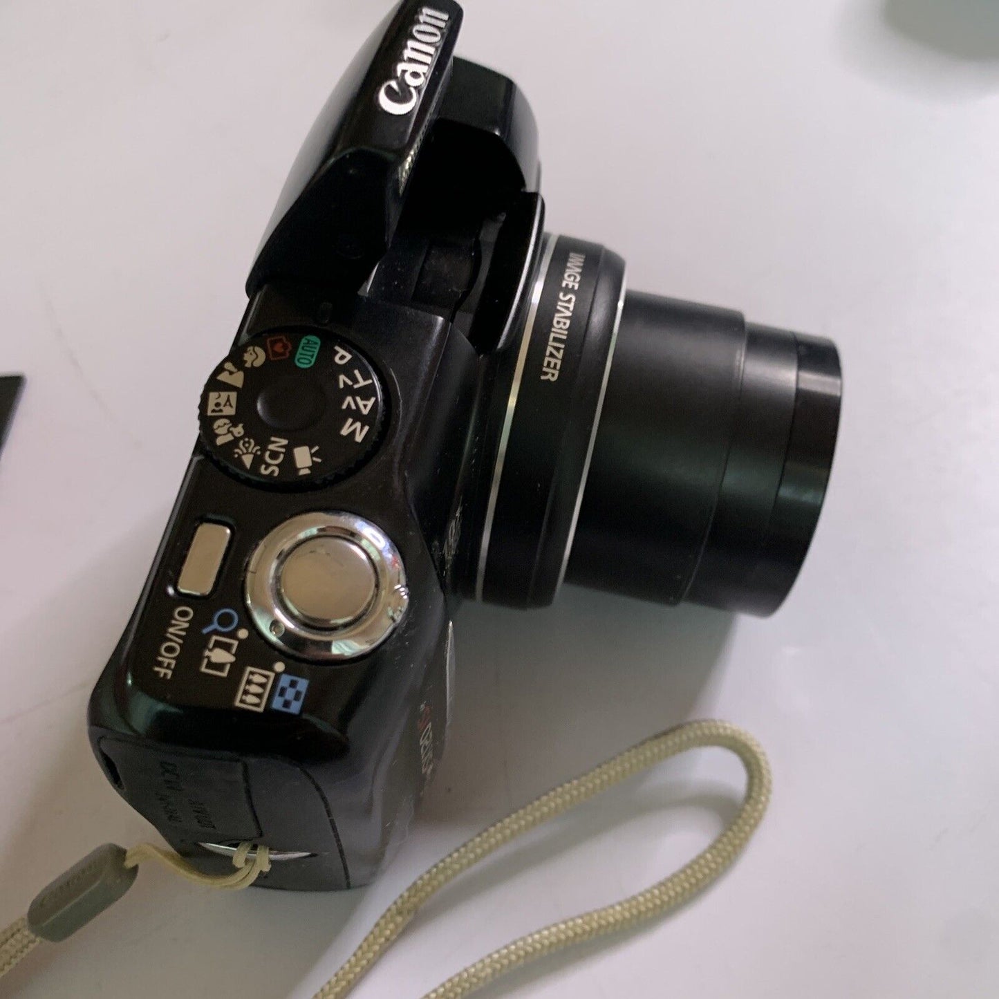 Canon PowerShot SX1 IS 10.0 MP Digital Camera 20x Optical Zoom Flash