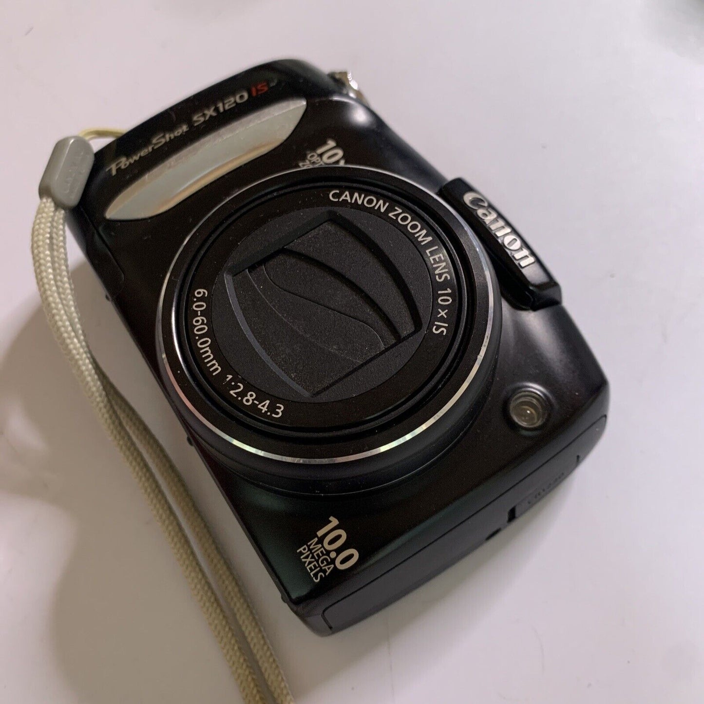 Canon PowerShot SX1 IS 10.0 MP Digital Camera 20x Optical Zoom Flash