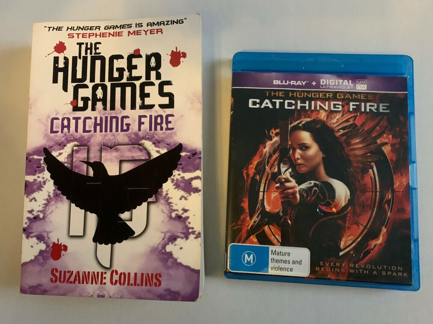 The Hunger Games Catching Fire by Suzanne Collins (Paperback, 2009) & Bluray