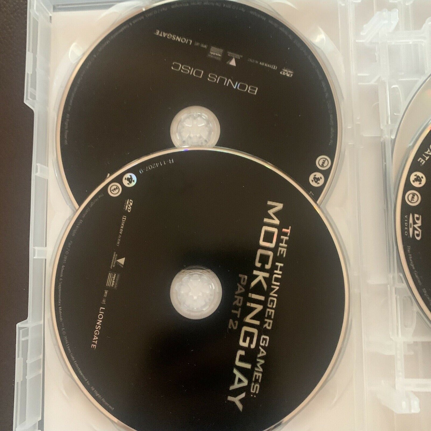 The HUNGER GAMES Complete 4-Film Collection DVD 7-Disc Catching Fire Mockingjay