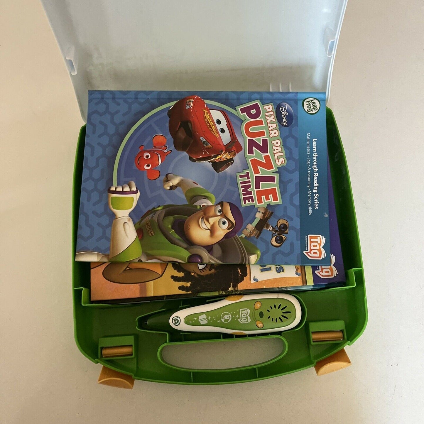 LeapFrog Tag Reading System with Case, 5 Books (Toy Story, Cars, Dora) and pen.