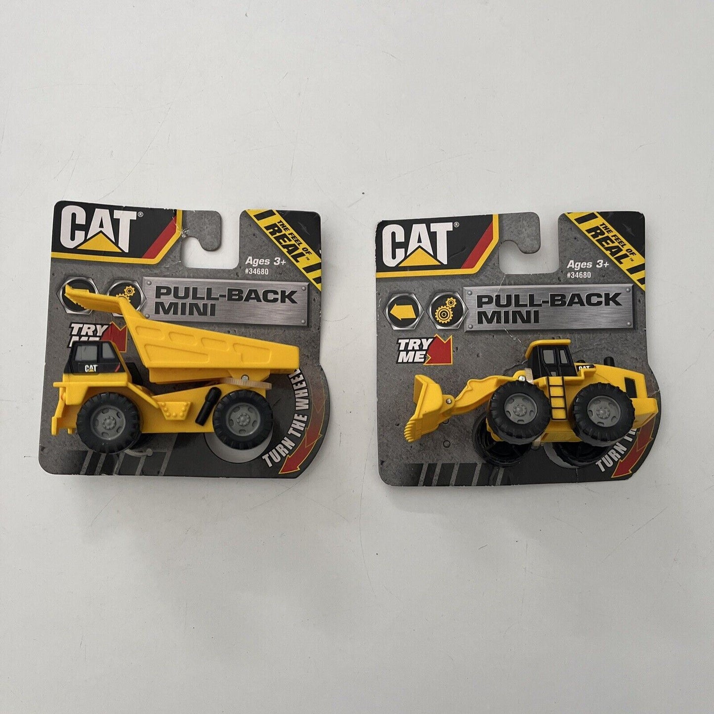 2x CAT Pull-Back Mini Bulldozer + Truck NEW